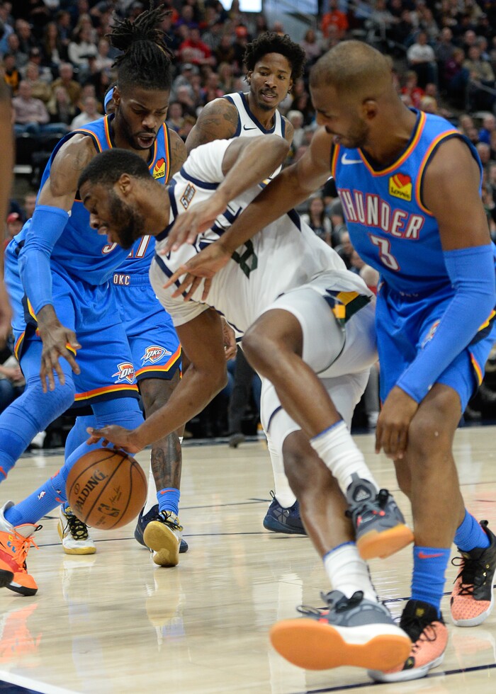 (Francisco Kjolseth  |  The Salt Lake Tribune) Utah Jazz guard Emmanuel Mudiay (8) stumbles as the Utah Jazz host the Oklahoma City Thunder in their NBA basketball game at Vivint Smart Home Arena in Salt Lake City on Mon. Dec. 9, 2019.