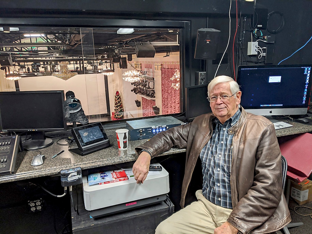 (Ashtyn Asay | The Herald Journal | AP) Gary Griffin poses for a photo in the Utah Theatre sound booth, Saturday, Dec. 21, 2019, in Logan, Utah. The theater that recently underwent a major renovation and is showing classic favorites using modern technology.