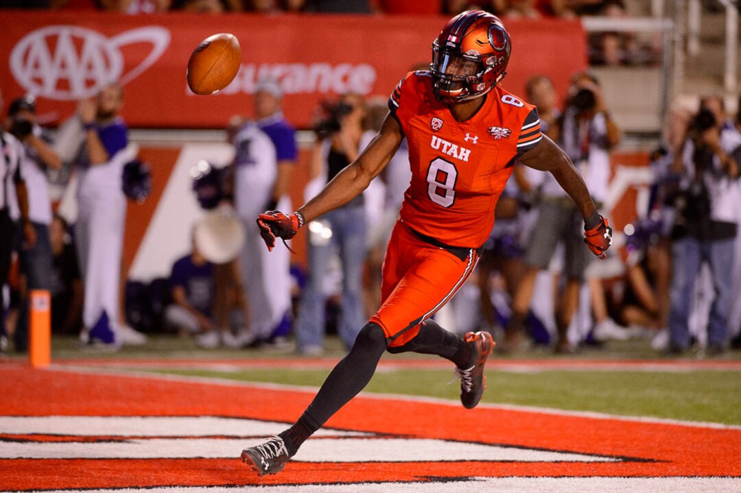 (Trent Nelson | The Salt Lake Tribune)  Utah Utes wide receiver Siaosi Mariner (8) scores a touchdown as the University of Utah Utes host the Weber State Wildcats, Thursday Aug. 30, 2018 at Rice-Eccles Stadium in Salt Lake City.