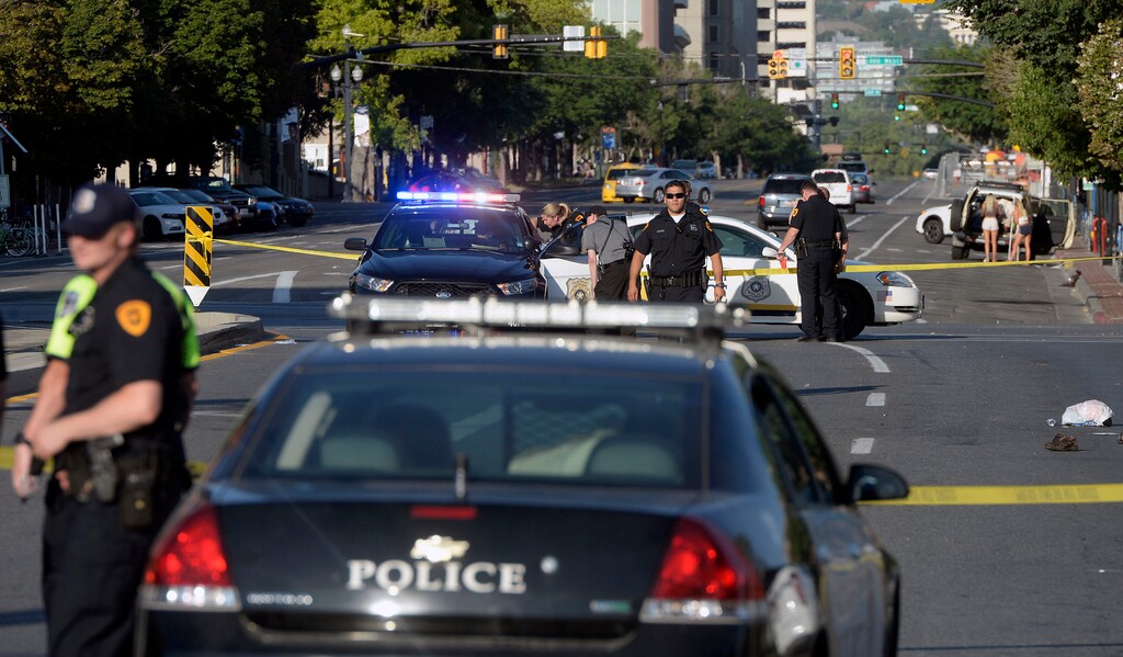 Al Hartmann  |  The Salt LakeTribuneSalt Lake City Police investigate fatal auto pedestrian scene at about 400 West and 200 South Tuesday July 4 evening in which six people were injured and one killed.  It was about one-half block from the Road Home Shelter. 