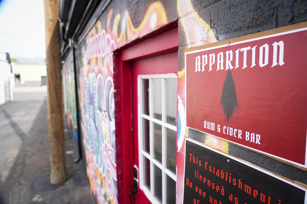 (Bethany Baker  |  The Salt Lake Tribune) A sign hangs beside the door to Apparition, a new bar, in Salt Lake City on Wednesday, April 23, 2025.