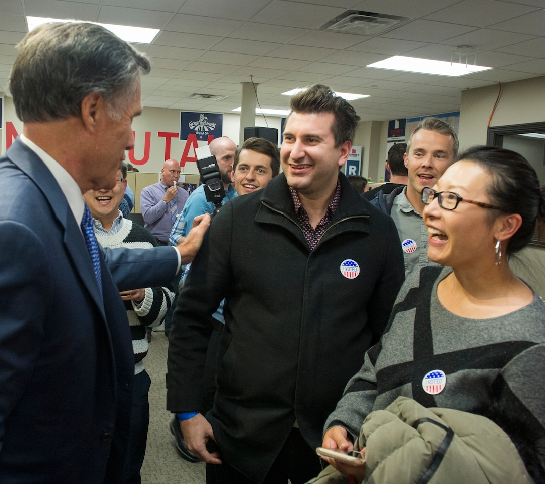 (Rick Egan  |  The Salt Lake Tribune)   Mitt Romney greets Greg Klekes and Jessie Li at the Romney Headquarters, in Orem, as they wait for the polls to close, on election night, Tuesday, Nov. 6, 2018.