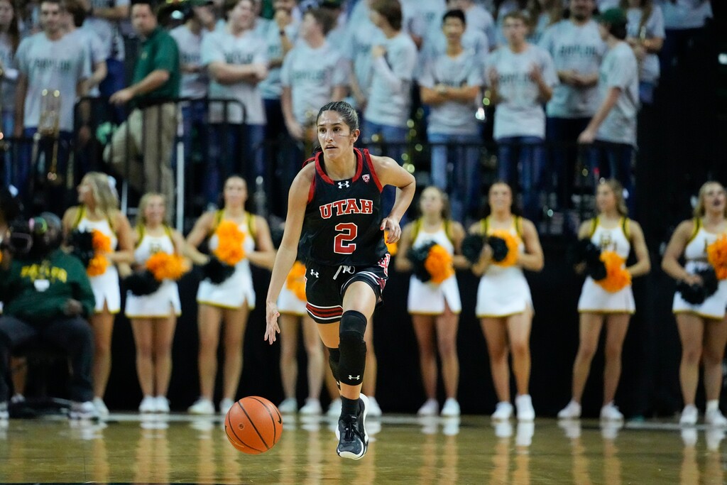 (Julio Cortez | AP) Utah's Ines Vieira dribbles up court against Baylor during the first half of an NCAA college basketball game, Tuesday in Waco, Texas.