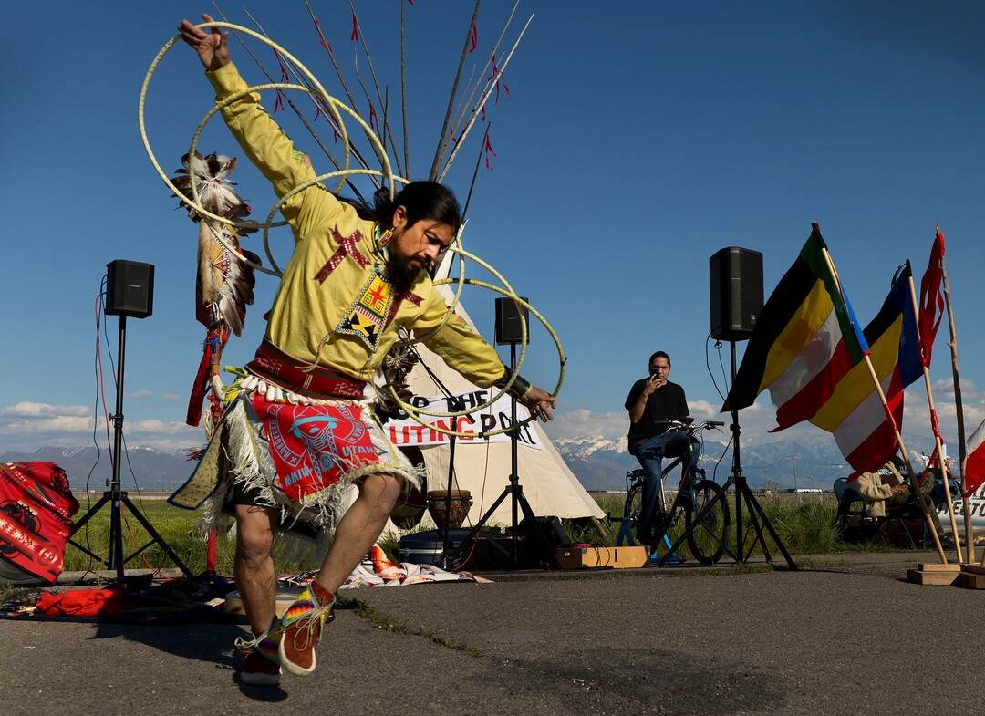 Leah Hogsten  |  The Salt Lake Tribune  Carl Moore, a Hopi and Chemehuevi Native American performs a hoop dance in honor of Mother Earth. Moore also made offerings, sang and gave a prayer during the May Day celebration. The "Stop the Polluting Port" community coalition staged a May Day celebration, calling for respect and awareness of the water, earth and air regarding the 20,000 acres west of Salt Lake City where the inland port industrial site has been proposed.