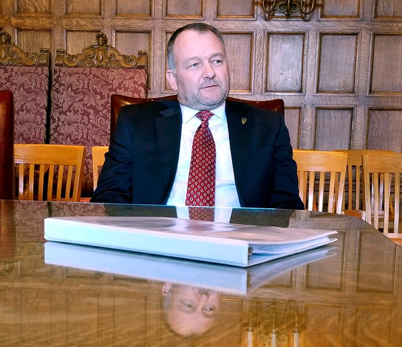 New Yellowstone National Park Superintendent Cam Sholly speads during a meeting with Montana Gov. Steve Bullock at the state Capitol in Helena, Mont., Tuesday, Oct. 23, 2018. Sholly says he will not consider capping the number of visitors to the nation's first national park, but would consider looking at ways to reduce traffic. (AP Photo/Amy Beth Hanson)