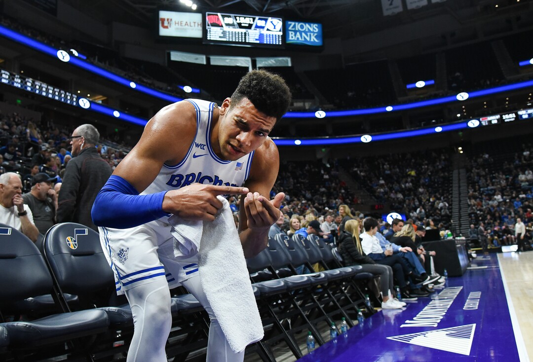 (Francisco Kjolseth  |  The Salt Lake Tribune)  Brigham Young Cougars forward Yoeli Childs (23) points to his contact lens that came out during the game against UNLV in men's NCAA basketball at Vivint Smart Home Arena in Salt Lake City on Sat. Dec. 7, 2019.