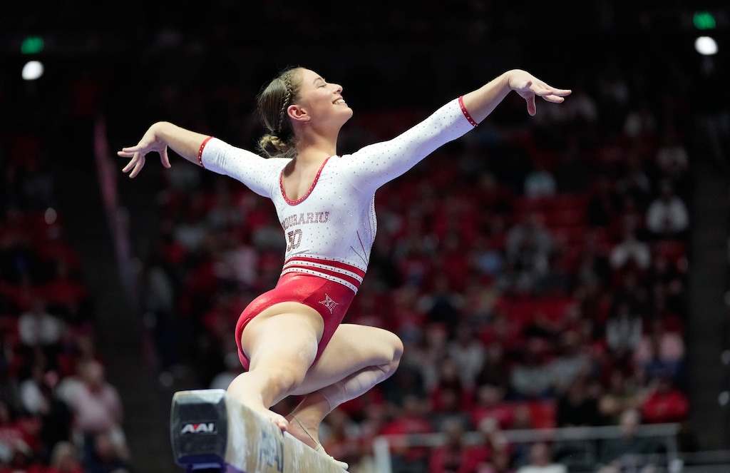 (Francisco Kjolseth  | The Salt Lake Tribune) The Utah Red Rocks’ Ana Padurariu performs on the beam during a gymnastics meet against Arizona at the Huntsman Center in Salt Lake City on Friday, February. 7, 2025. The University of Utah won.