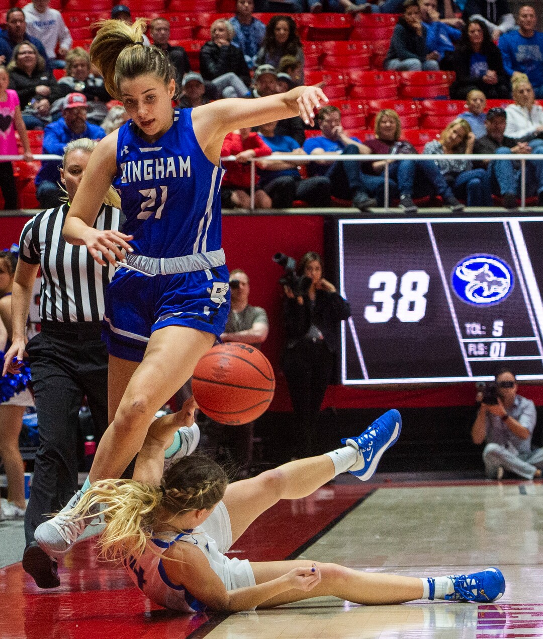 (Rick Egan  |  The Salt Lake Tribune)   Bingham Miners Chloe Daniels  (21)  tries to save the ball as she collides with Fremont Sliverwolves Daycee Townsend (14),  in the 6A championship game, between the Fremont Sliverwolves and the Bingham Miners, at the Jon M. Huntsman Center, Saturday Feb. 29, 2020