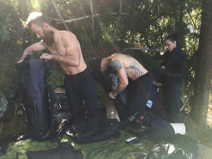 (Photo courtesy Discovery Channel) Guy Higgins and Josh undress as Danielle Martin hangs out in an episode of "Ultimate Ninja Challenge."