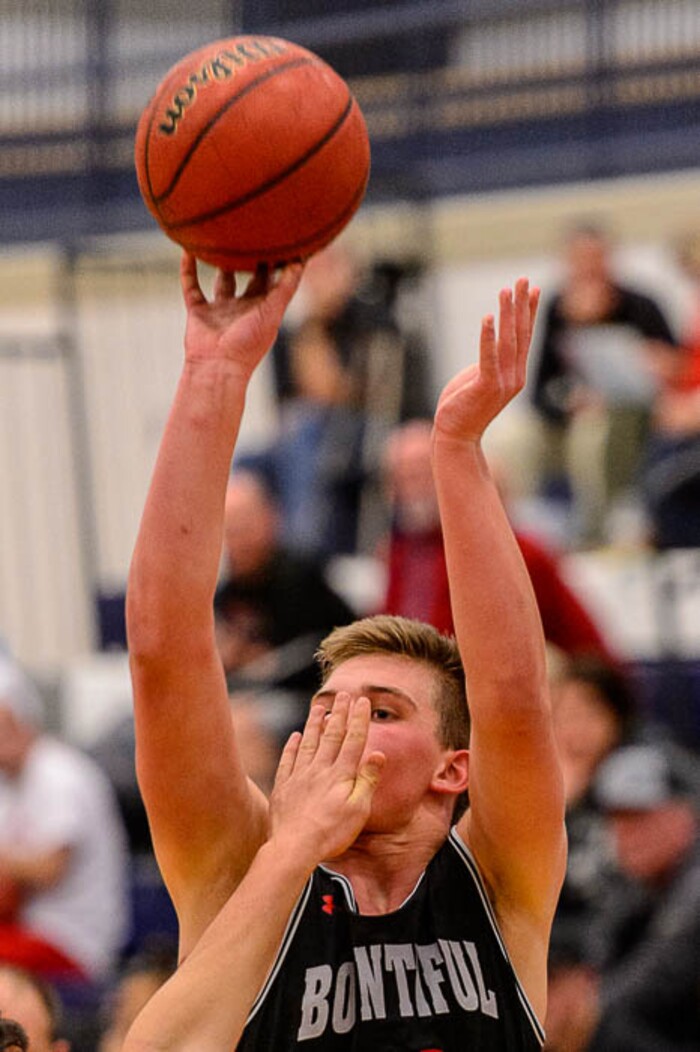 (Trent Nelson | The Salt Lake Tribune)  Bountiful's Brig Willard (10) shoots with Corner Canyon's Luke Warnock (5) defending as Corner Canyon faces Bountiful in the title game of the Corner Canyon Tournament of Champions, high school boys' basketball in Draper, Saturday December 2, 2017.
