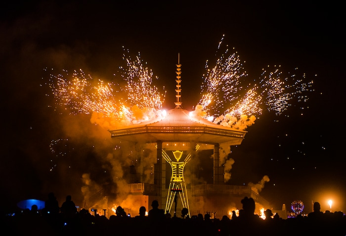 (Rick Egan  |  The Salt Lake Tribune)Fireworks explode as the man starts to burn, in the Black Rock Desert, 100 miles north of Reno, NV, Saturday, September 2, 2017. 