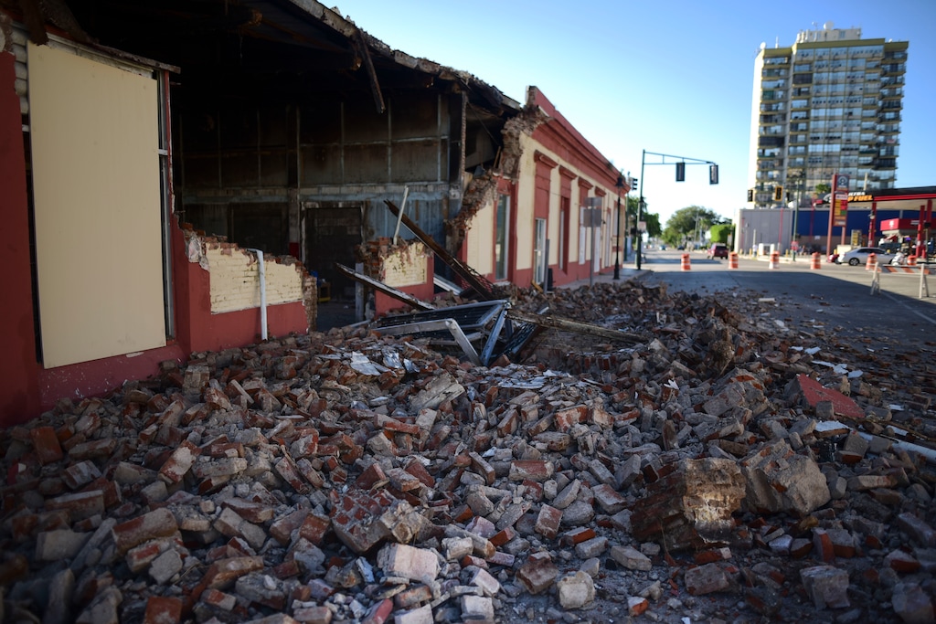 (Carlos Giusti | AP) Debris from a collapsed wall of a building litters the ground after an earthquake struck Puerto Rico before dawn, in Ponce, Puerto Rico, Tuesday, Jan. 7, 2020.