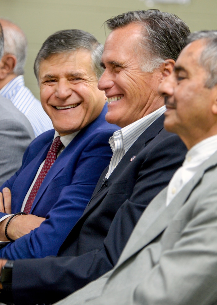 Leah Hogsten  |  The Salt Lake Tribune  Utah Islamic Center members share a laugh with Republican U.S. Senate candidate Mitt Romney, Oct. 26, 2018 before friday special prayers.