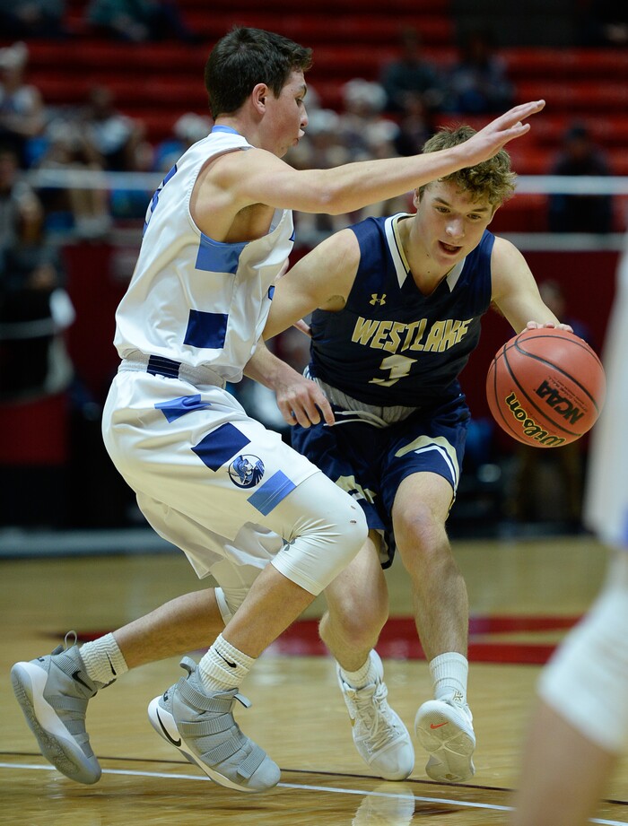 (Francisco Kjolseth  |  The Salt Lake Tribune)  Westlake vs Layton, 6A State high school basketball tournament at the Huntsman Center in Salt Lake City, Thursday March 1, 2018. Conner Hill, left, (3), Austin White (3). 