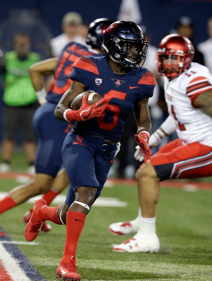 Arizona wide receiver Shun Brown (6) runs for a first down against Utah during the first half of an NCAA college football game, Friday, Sept. 22, 2017, in Tucson, Ariz. (AP Photo/Rick Scuteri)