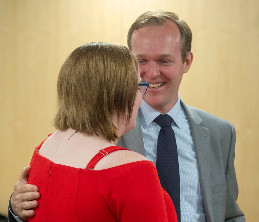 (Rick Egan  |  The Salt Lake Tribune)   Congressman Ben McAdams gives Julia Ludlow a hug, after she spoke about her suicide attempt at a news conference about suicide prevention, Monday, July 8, 2019.