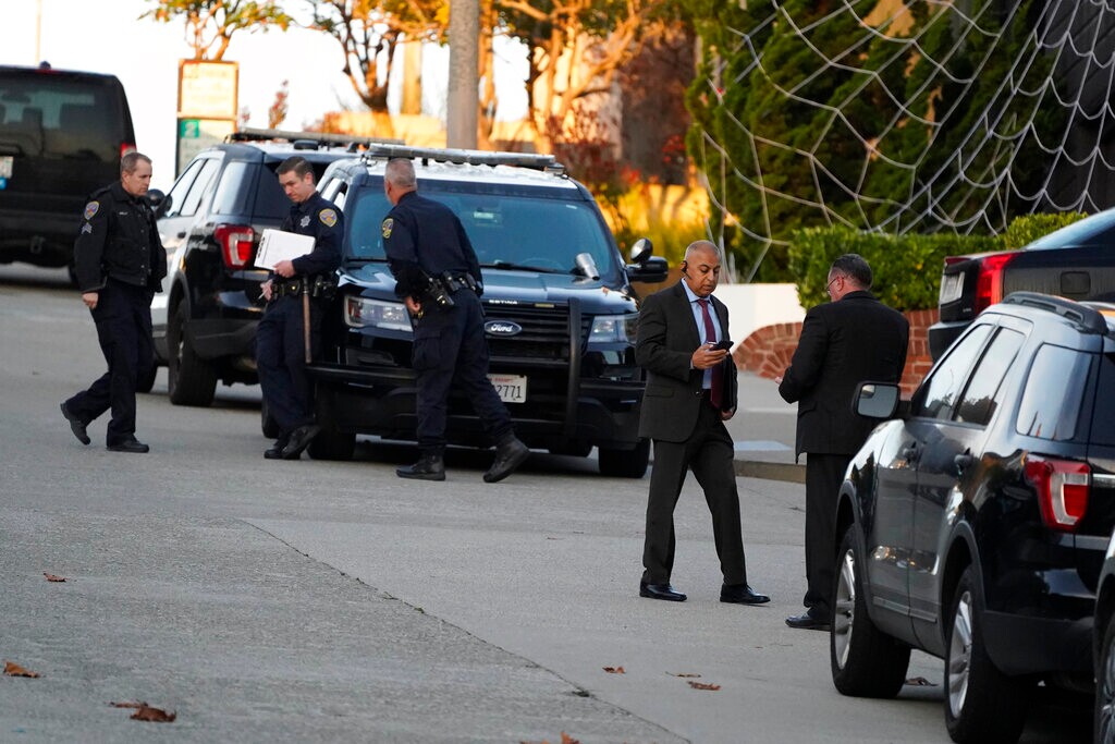 (Eric Risberg | AP Photo) Police investigators work outside the home of Paul Pelosi, the husband of House Speaker Nancy Pelosi, in San Francisco, Friday, Oct. 28, 2022. Paul Pelosi, was attacked and severely beaten by an assailant with a hammer who broke into their San Francisco home early Friday, according to people familiar with the investigation.
