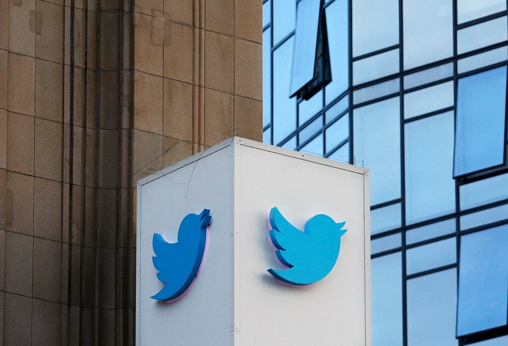 (Jeff Chiu | The Associated Press) This Wednesday, Oct. 26, 2016, photo shows a Twitter sign outside of the company's headquarters in San Francisco. Twitter will be enforcing stricter policies on violent and abusive content such as hateful images or symbols, including those attached to user profiles, the company announced Monday, Dec. 18, 2017.