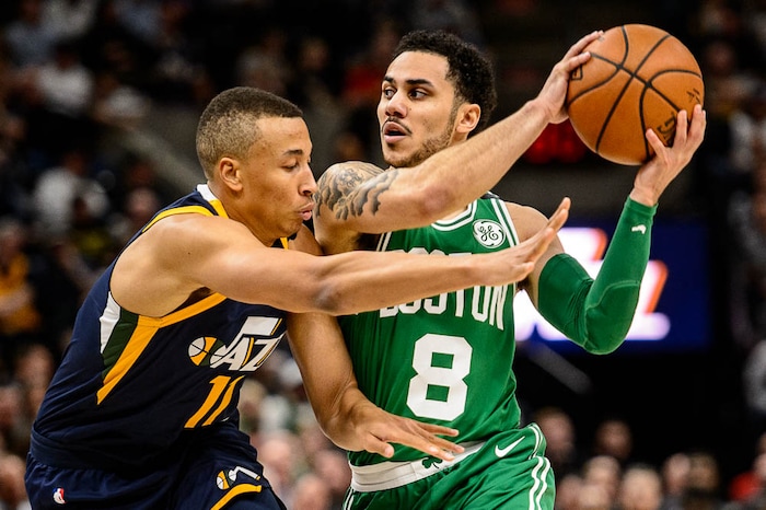 (Trent Nelson | The Salt Lake Tribune)  
Utah Jazz vs. Boston Celtics, NBA basketball in Salt Lake City, Wednesday March 28, 2018. Utah Jazz guard Dante Exum (11) defends Boston Celtics guard Shane Larkin (8).