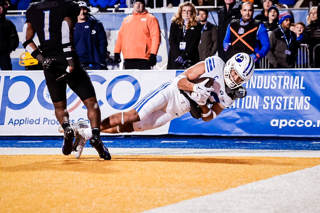 BYU WR Puka Nacua toe-taps for a game-winning touchdown against Boise State. He finished with 157 yards and 14 catches. (BYU Athletics)