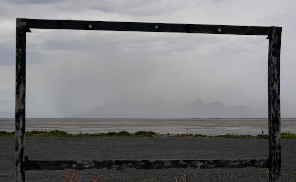 (Francisco Kjolseth | The Salt Lake Tribune) Framed by dust, strong winds blow fine particulate matter obstructing the view of Antelope Island on the Great Salt Lake Friday, Sept. 1, 2023.