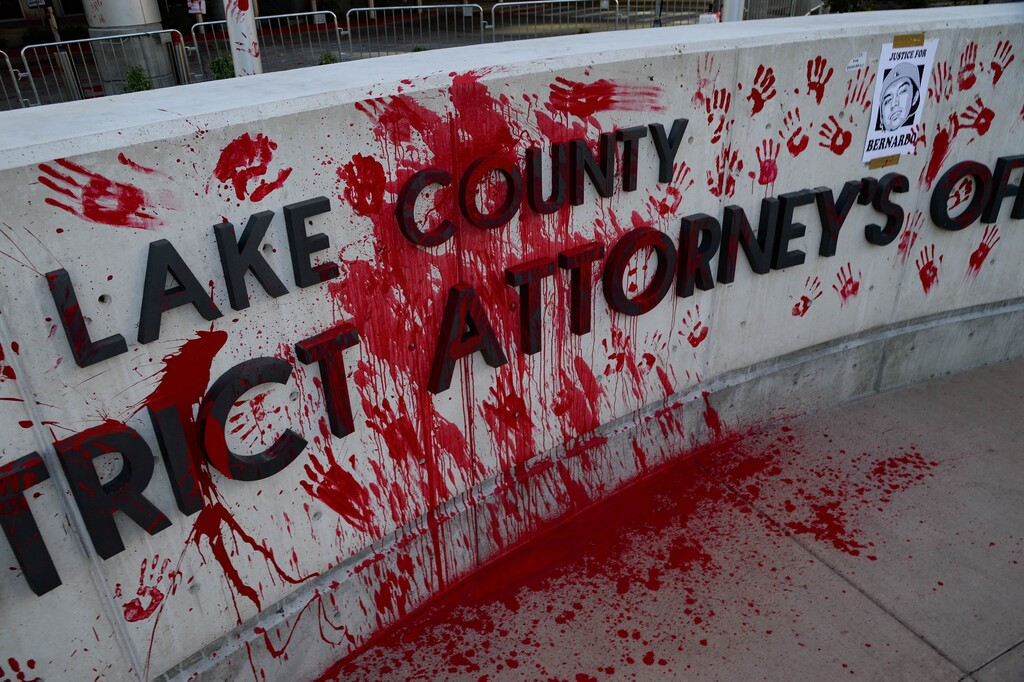 (Francisco Kjolseth | Tribune file photo) Protesters painted the district attorney building red and covered it with posters in reaction to the announced ruling by Salt Lake County District Attorney Sim Gill on Thursday, July 9, 2020, that the shooting death of 22-year-old Bernardo Palacios-Carbajal in May by police officers was legally justified.