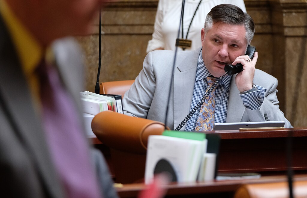 (Francisco Kjolseth | The Salt Lake Tribune) Rep. John Knotwell, R-Herriman, sponsor of HB169 which would shift $1.7 million in fees owed by EnergySolutions to taxpayers speaks on the phone during the legislative session at the Utah Capitol on Wednesday, Jan. 31, 2018.
