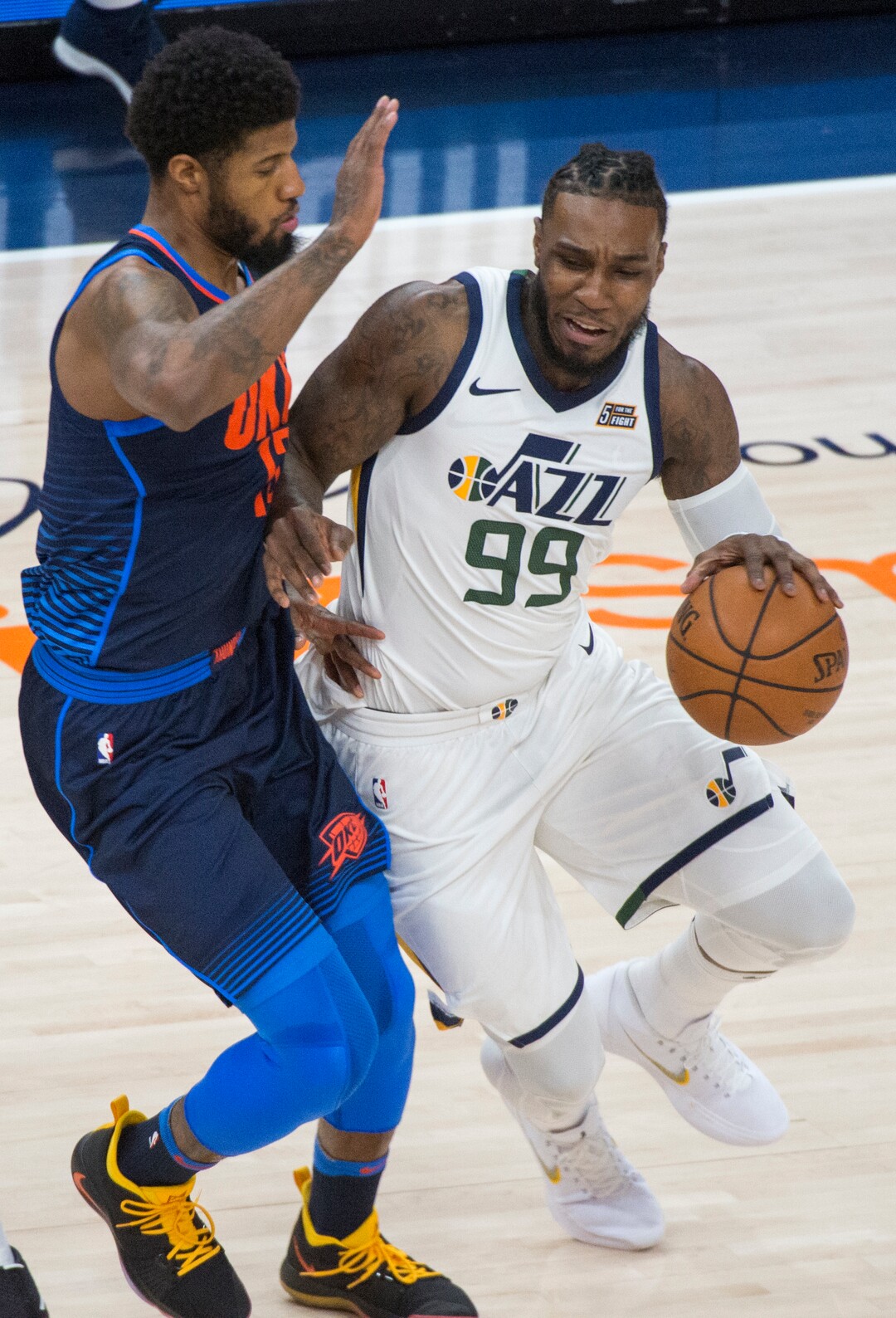 (Rick Egan  |  The Salt Lake Tribune)    Utah Jazz forward Jae Crowder (99) works the ball, as Oklahoma City Thunder forward Kyle Singler (15)defends,in game 4, NBA playoff action between Utah Jazz and Oklahoma City Thunder, in Salt Lake City, Monday April 23, 2018.