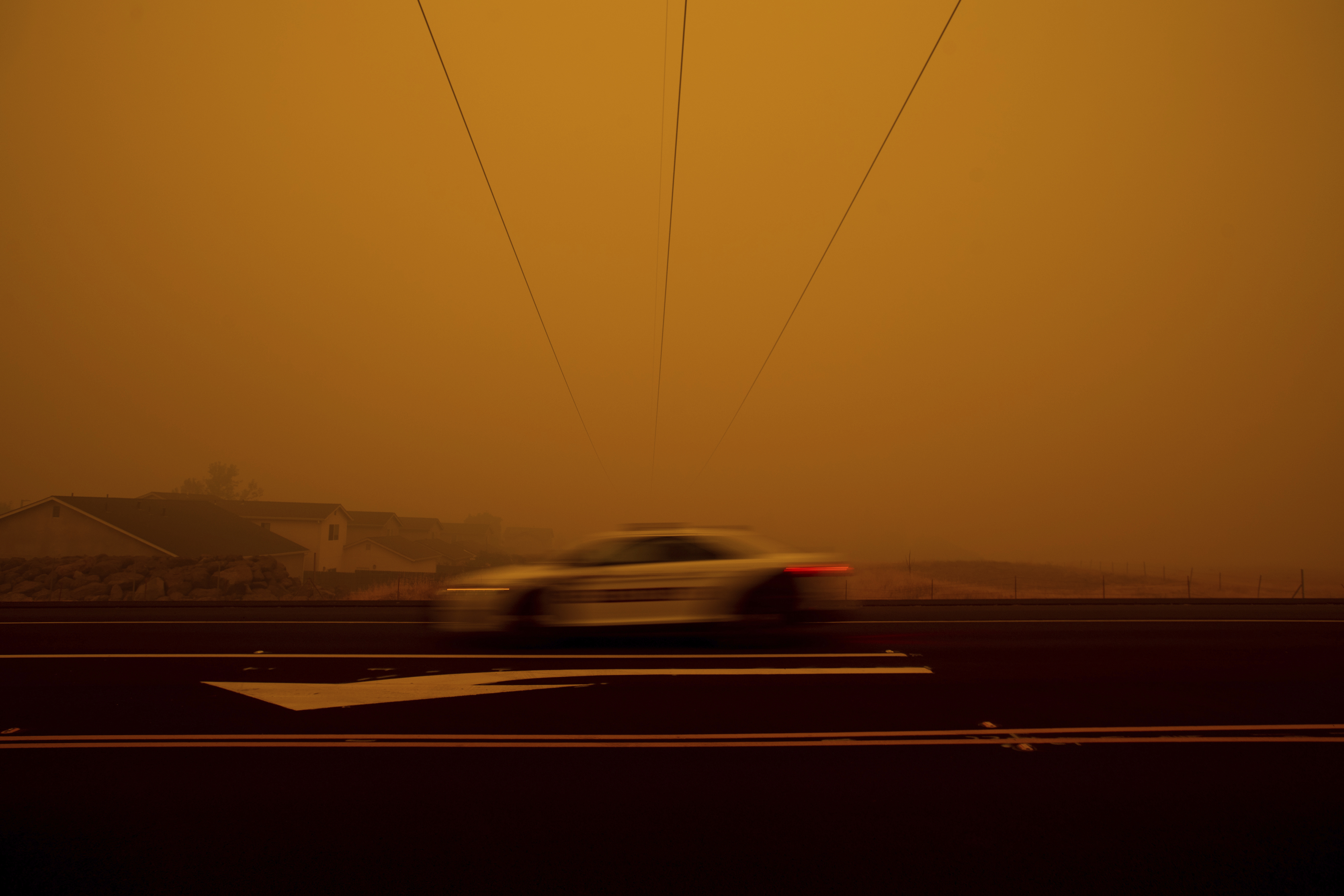 Haze from the Camp Fire fills the air above Chico, Calif., on Friday, Nov. 9, 2018. (AP Photo/Noah Berger)