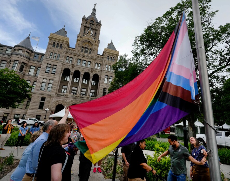 (Francisco Kjolseth | The Salt Lake Tribune) A pride flag is raised at Washington Square by Salt Lake City and LGBTQ+ leaders, marking the beginning of Pride Month on Thursday, June 1, 2023.