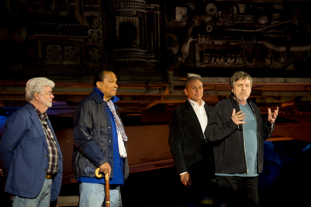 (Jeremy Harmon  |  The Salt Lake Tribune) Mark Hamill speaks during the dedication ceremony for Star Wars: Galaxy's Edge in Anaheim, Ca. on Wednesday, May 29, 2019. With him on stage are George Lucas, Billy Dee Williams and Disney CEO Bob Iger.