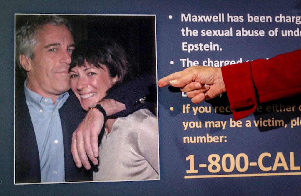 FILE - In this July 2, 2020, file photo, Audrey Strauss, acting U.S. attorney for the Southern District of New York, points to a photo of Jeffrey Epstein and Ghislaine Maxwell during a news conference in New York. (AP Photo/John Minchillo, File)
