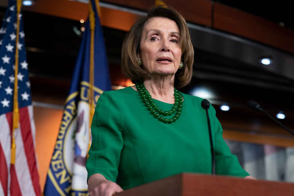 FILE - In this Thursday, Dec. 20, 2018 file photo, House Democratic Leader Nancy Pelosi of California, talks to reporters as Congress tries to pass legislation that would avert a partial government shutdown, at the Capitol in Washington. Pelosi and President Donald Trump both think they have public sentiment on their side in the battle over a border wall. That theory will be put the test this week when the new House Democratic majority led by Pelosi gavels into session with legislation to end the government shutdown. (AP Photo/J. Scott Applewhite, File)