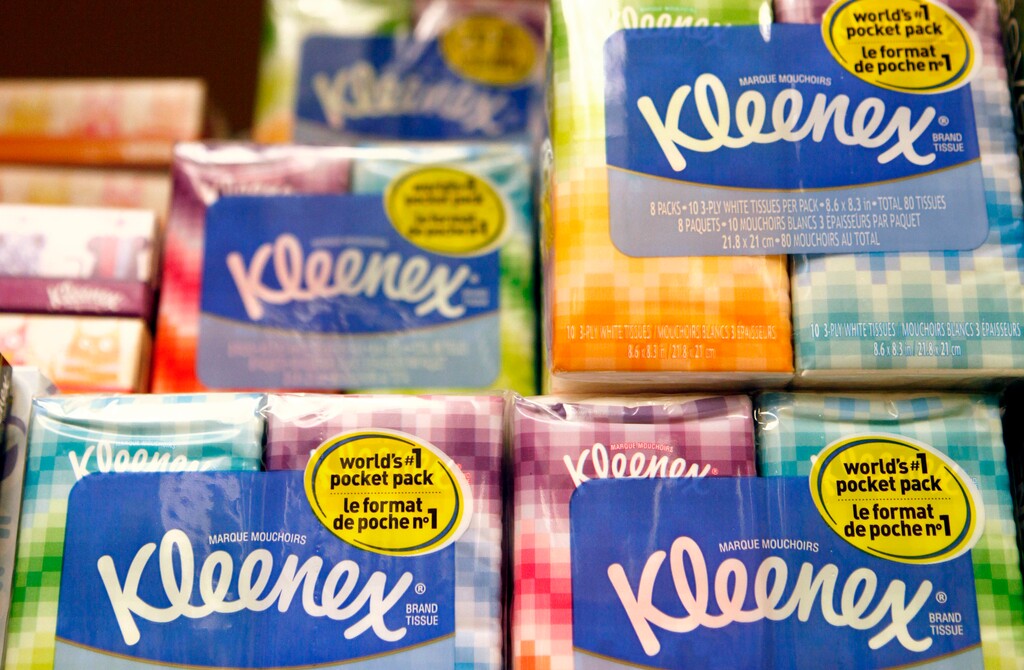 (Jeff Chiu | The Associated Press) This Jan. 20, 2011, file photo shows packages of Kleenex tissues, a Kimberly Clark brand, at a store in San Francisco. Kimberly-Clark is cutting 5,000 to 5,500 jobs, or 12 percent to 13 percent of its workforce, as the consumer products company tries to lower costs. The Huggies and Kleenex maker said Tuesday, Jan. 23, 2018, that it plans to close or sell about 10 manufacturing plants while expanding production elsewhere.