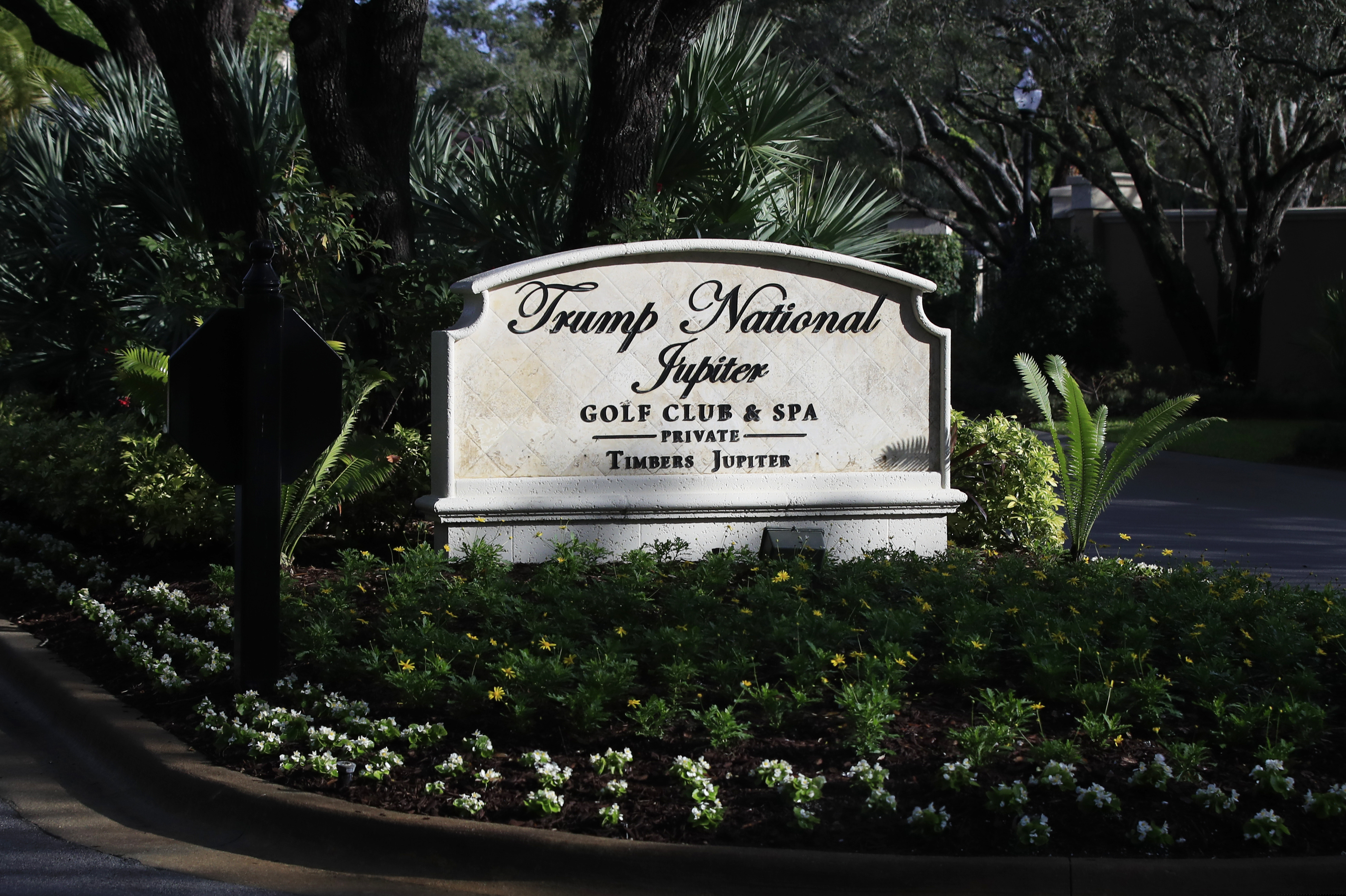 The entrance to Trump National Golf Club in Jupiter, Fla., is shown Saturday, Feb. 2, 2019, where President Donald Trump is playing a round of golf with golfers Jack Nicklaus and Tiger Woods. Trump and his family are spending the weekend at his his Mar-a-Lago estate in Palm Beach, Fla. (AP Photo/Manuel Balce Ceneta)