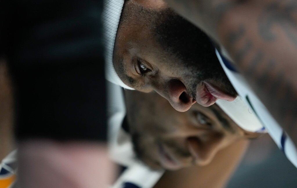 (Francisco Kjolseth | The Salt Lake Tribune) Utah Jazz forward Danuel House Jr. (25) and Utah Jazz forward Royce O'Neale (23) have a quiet conversation as a win hangs in the balance in the final minutes of Game 4 of an NBA basketball first-round playoff series, Saturday, April 23, 2022, in Salt Lake City. Jazz won 100-99.