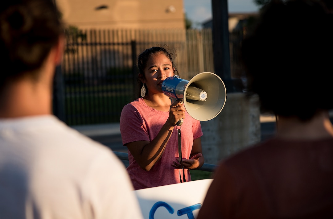 Michael Mangum  |  Special to the Tribune

Claudia Loayza of South Jordan speaks to the crowd during a protest outside the U.S. Immigration and Customs Enforcement Salt Lake City Field Office in West Valley City, UT on Wednesday, July 24, 2019.