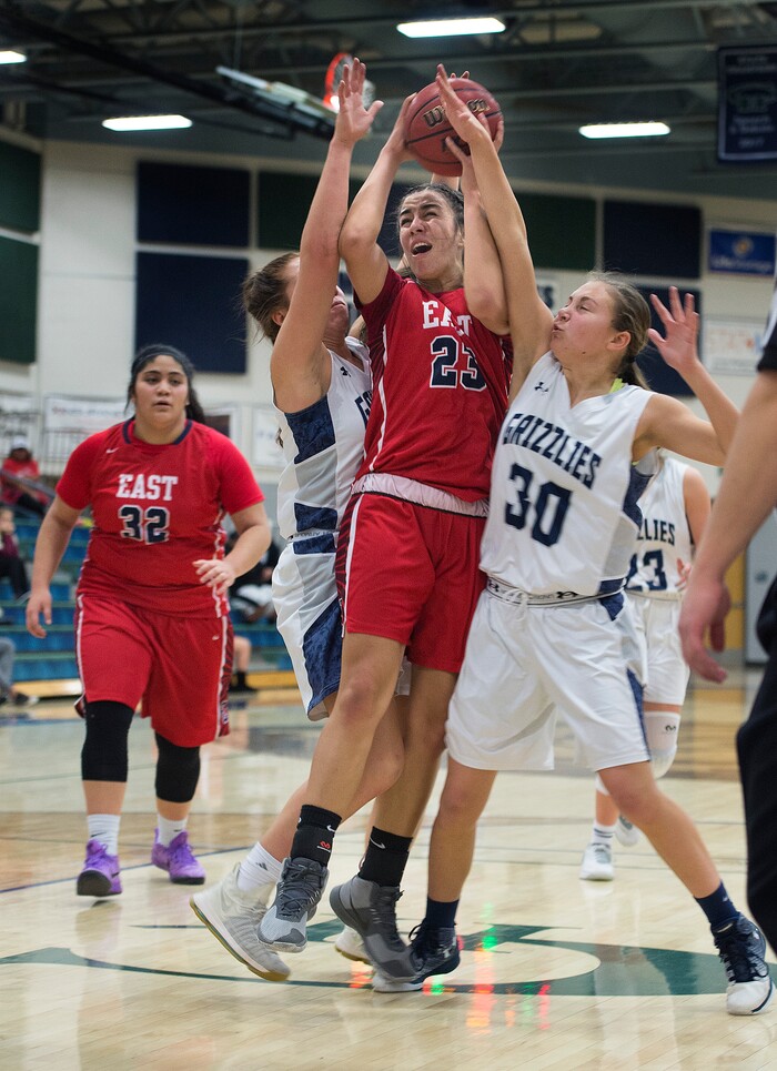 (Scott Sommerdorf | The Salt Lake Tribune)
The Copper Hills defense double teams East's Liana Kaitu'u during first half play. Copper Hills defeated East 82-62, Friday, December 29, 2017.
