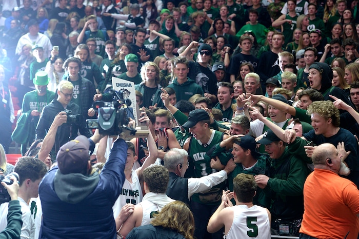 (Leah Hogsten | The Salt Lake Tribune) Olympus celebrates the win. Olympus defeated Corner Canyon 76-49 to win the 5A High School Boys’ Basketball Tournament Championship at the Jon M. Huntsman Center in Salt Lake City, Saturday, March 3, 2018.