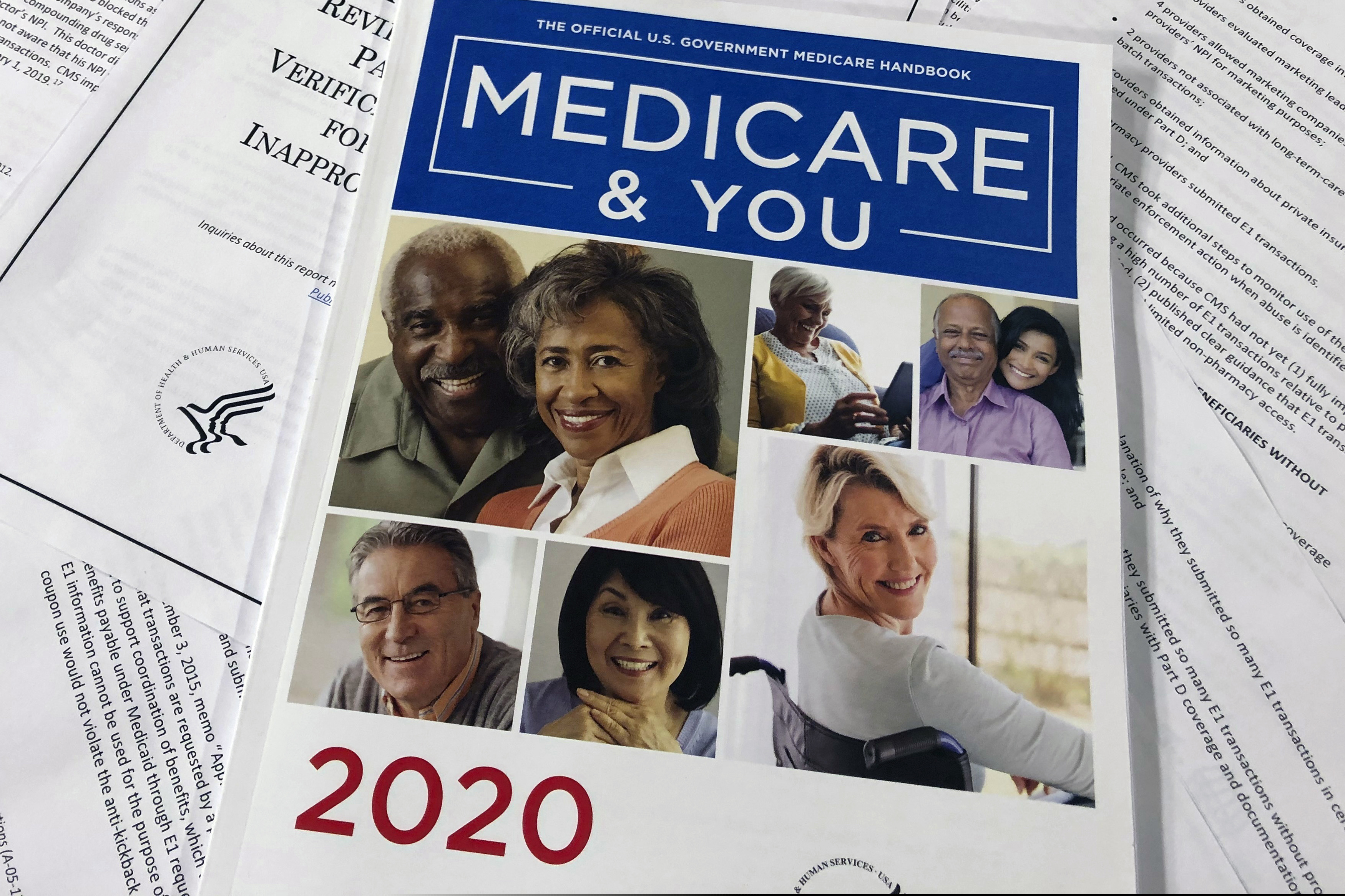 (Wayne Partlow | AP photo)

In this Feb. 13, 2020, photo, The Official U.S. Government Medicare Handbook for 2020 over pages of a Department of Health and Human Services, Office of the Inspector General report, are shown in Washington.