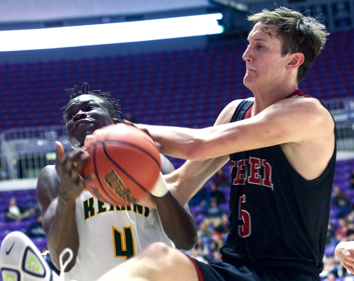 (Leah Hogsten  |  The Salt Lake Tribune) Kearns' Emmanuel Andrew (04) battles Weber's Braedon Iverson (05). Weber defeated Kearns 60-52 in the 6A High School Boys' Basketball Tournament opening game at Weber State University’s Dee Events Center in Ogden, Tuesday, Feb. 27, 2018. 