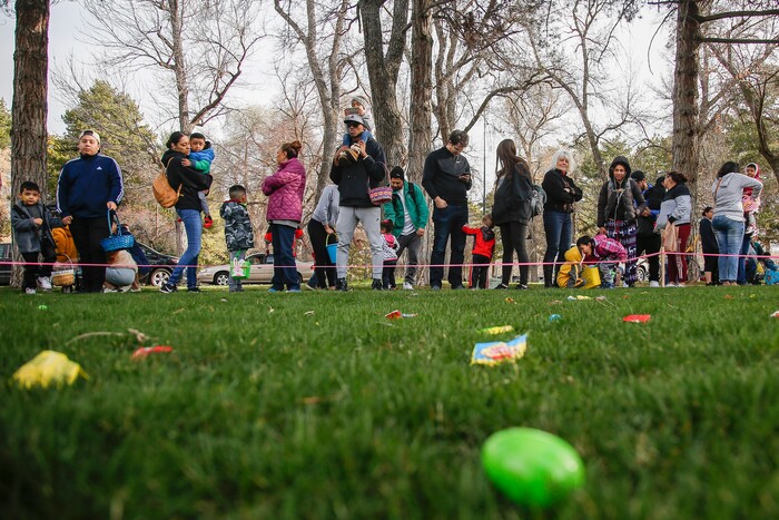(Nicole Boliaux | For The Tribune) Children and their families wait for the stroke of 9 o'clock to begin the annual Easter egg hunt put on by A Kid's Place Dentistry in Liberty Park in Salt Lake City on Saturday, March 31, 2018.