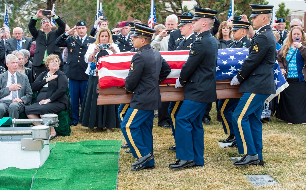 (Rick Egan  |  The Salt Lake Tribune)     The Honor Guard brings the casket to the gravesite of 2nd Lt. Lynn W. Hadfield, who was killed during the Second World War, at Veterans Memorial Park, in Bluffdale. Thursday, March 21, 2019.