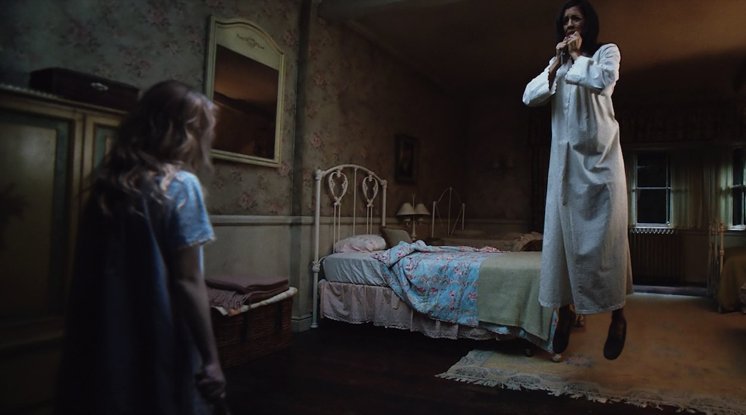 (  !  Warner Bros. Pictures) A possessed Janice (Talitha Bateman, left) suspends Sister Charlotte (Stephanie Sigman) in midair in  "Annabelle: Creation," a prequel to the 2014 horror movie spun off from "The Conjuring."