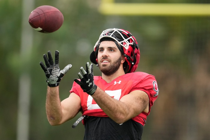 (Marcio Jose Sanchez | AP) Utah tight end Thomas Yassmin makes a catch during practice ahead of the Rose Bowl NCAA college football game against Penn State, Friday, Dec. 30, 2022, in Carson, Calif.