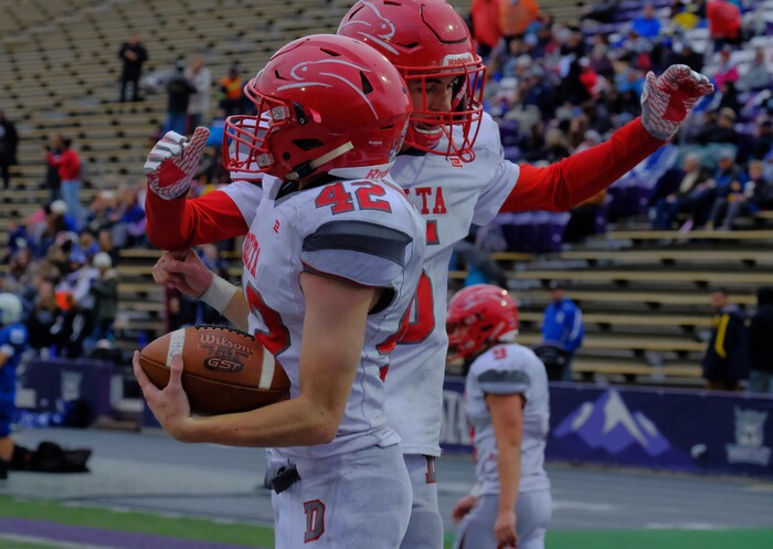 (Leah Hogsten  |  The Salt Lake Tribune) Delta's Dallin Draper celebrates his touchdown. Beaver High School boys' football team leads Delta High School 35-16 during their class 2A state semifinal football game Saturday, November 4, 2017 at Weber State University's Stewart Stadium.
