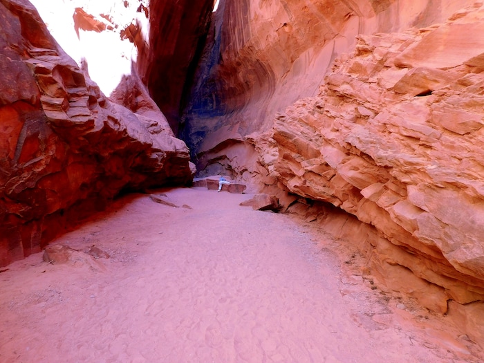 Erin Alberty  |  The Salt Lake TribuneA young hiker climbs onto a rock in Singing Canyon, along the Burr Trail Road in Grand Staircase-Escalante National Monument.