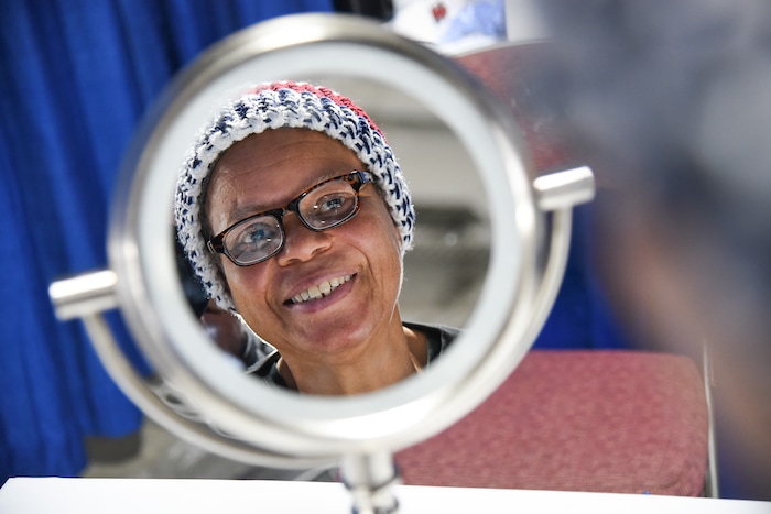 (Francisco Kjolseth  |  The Salt Lake Tribune)  Anita Finister gets fitted with a new pair of reading glasses as she exclaims "I can see, I can see," during Salt Lake CityÕs second annual Project Homeless Connect takes place at the Salt Palace Convention Center on Friday, Oct. 12, 2018. More than 800 community volunteers and 90 service providers connect those in need with more than 200 services.