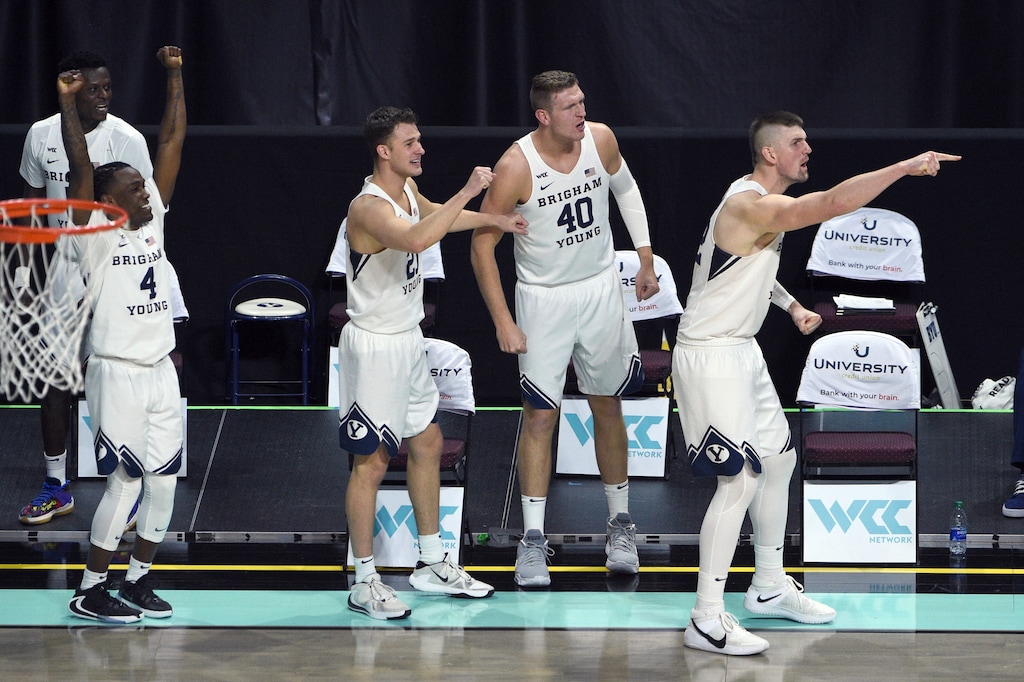 (David Becker | AP) The BYU bench cheers after a play against Pepperdine during the second half of an NCAA semifinal college basketball game at the West Coast Conference tournament Monday, March 8, 2021, in Las Vegas.