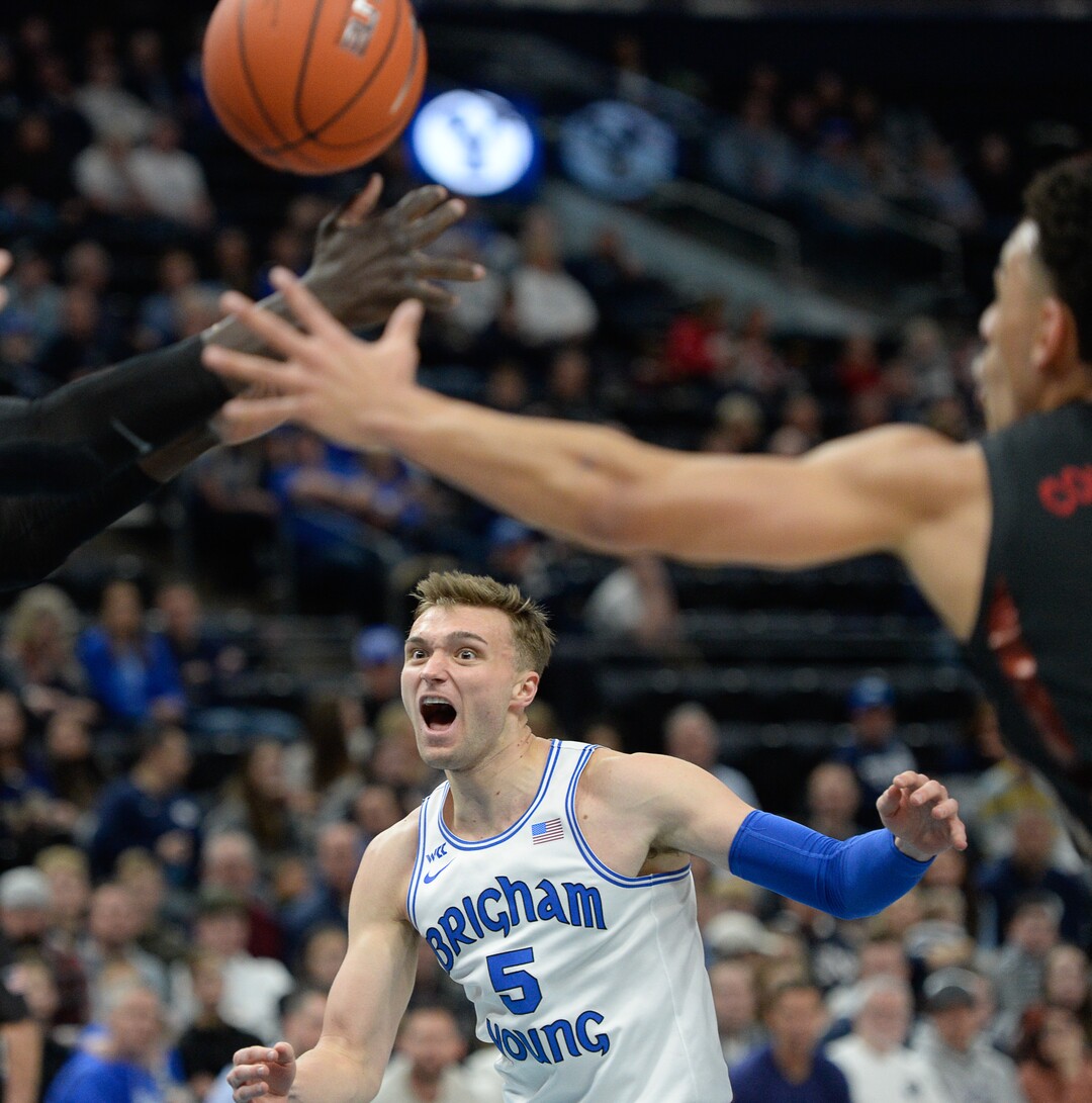 (Francisco Kjolseth  |  The Salt Lake Tribune)  Brigham Young Cougars guard Jake Toolson (5) sees his pass get clipped as BYU takes on UNLV in men's NCAA basketball at Vivint Smart Home Arena in Salt Lake City on Sat. Dec. 7, 2019.